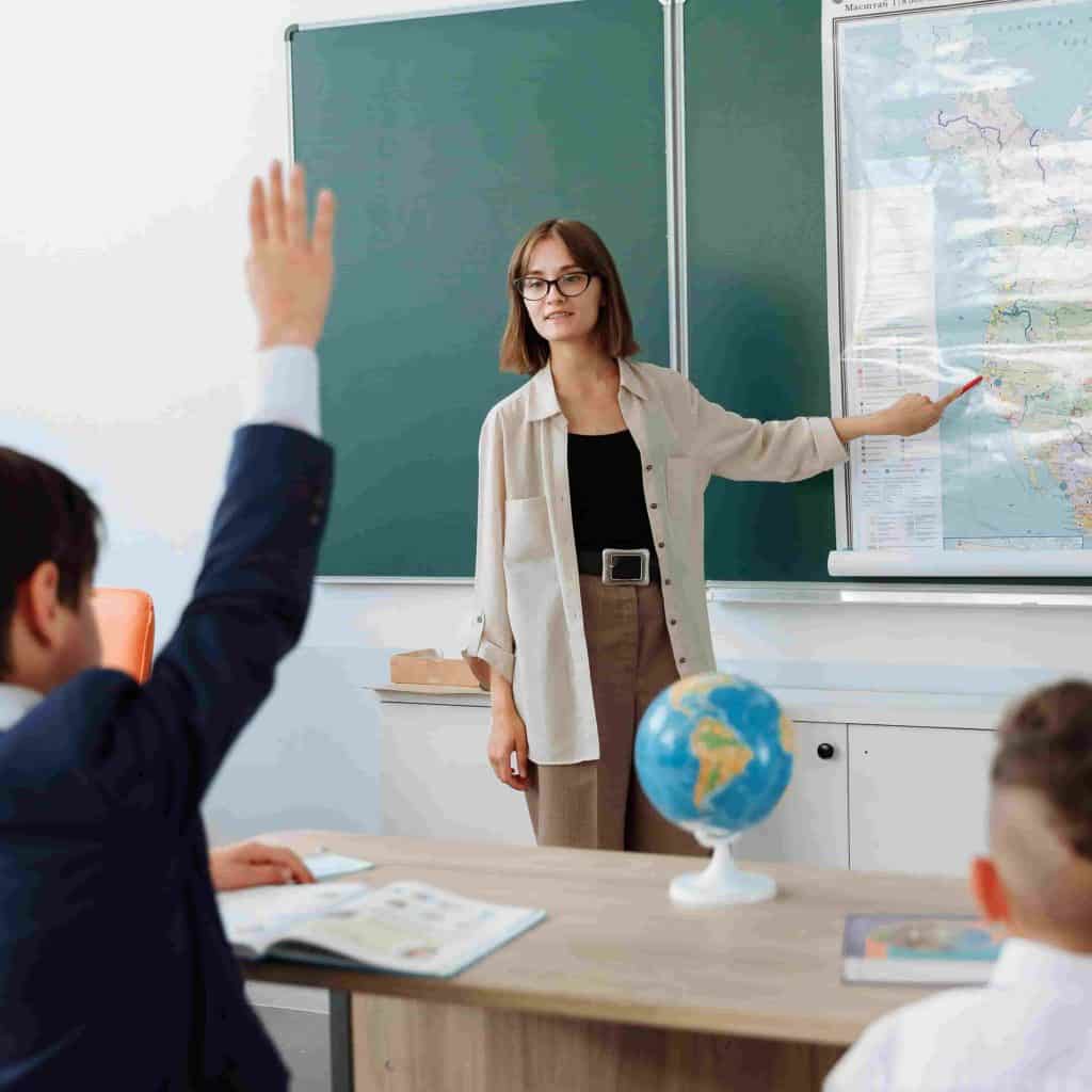 Aspiring teacher leading a classroom lesson during teacher training